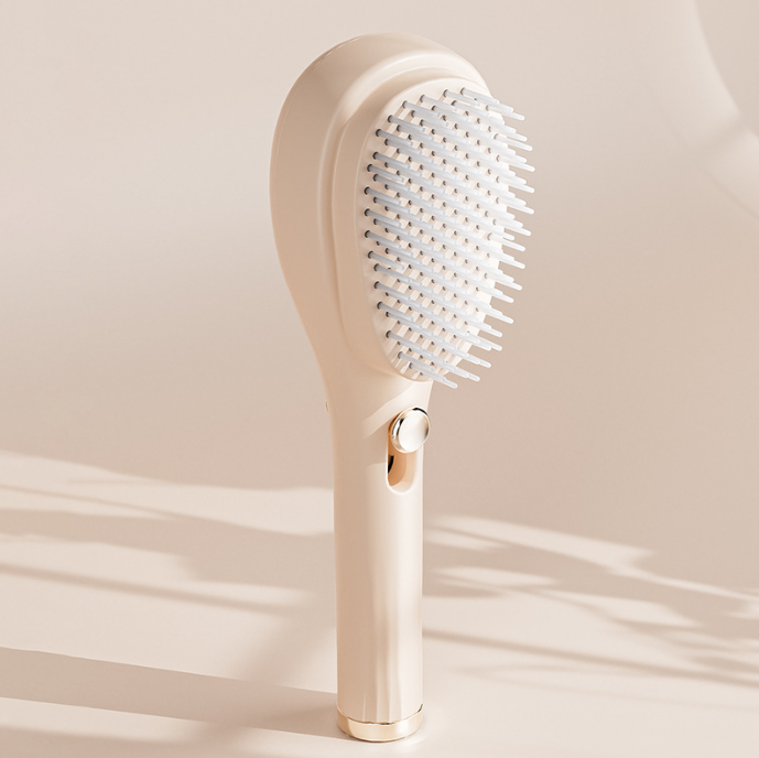 One-touch comb for cleaning broken hair, retractable anti-static comb